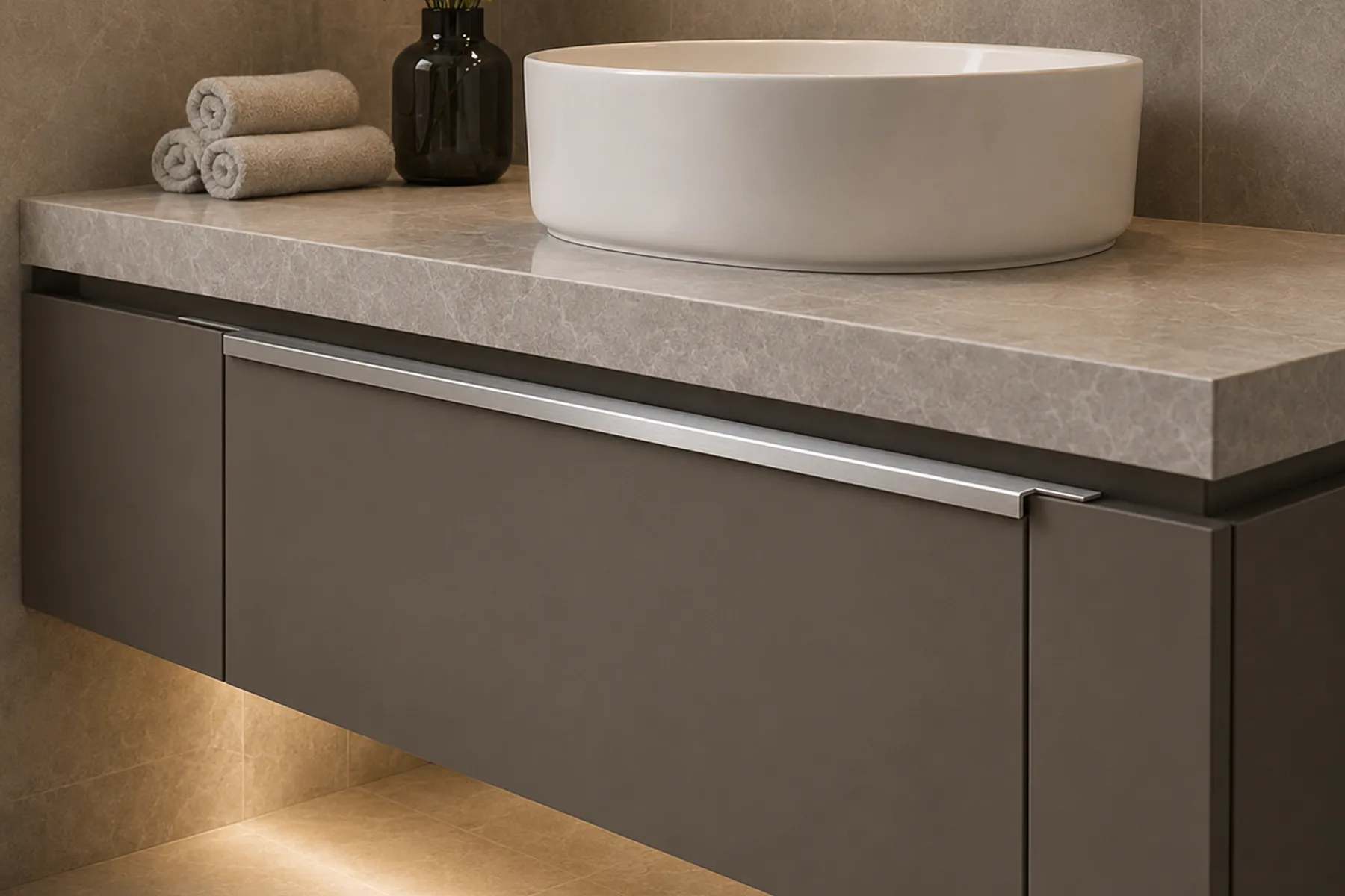 Aluminium handle profile on bathroom vanity drawers